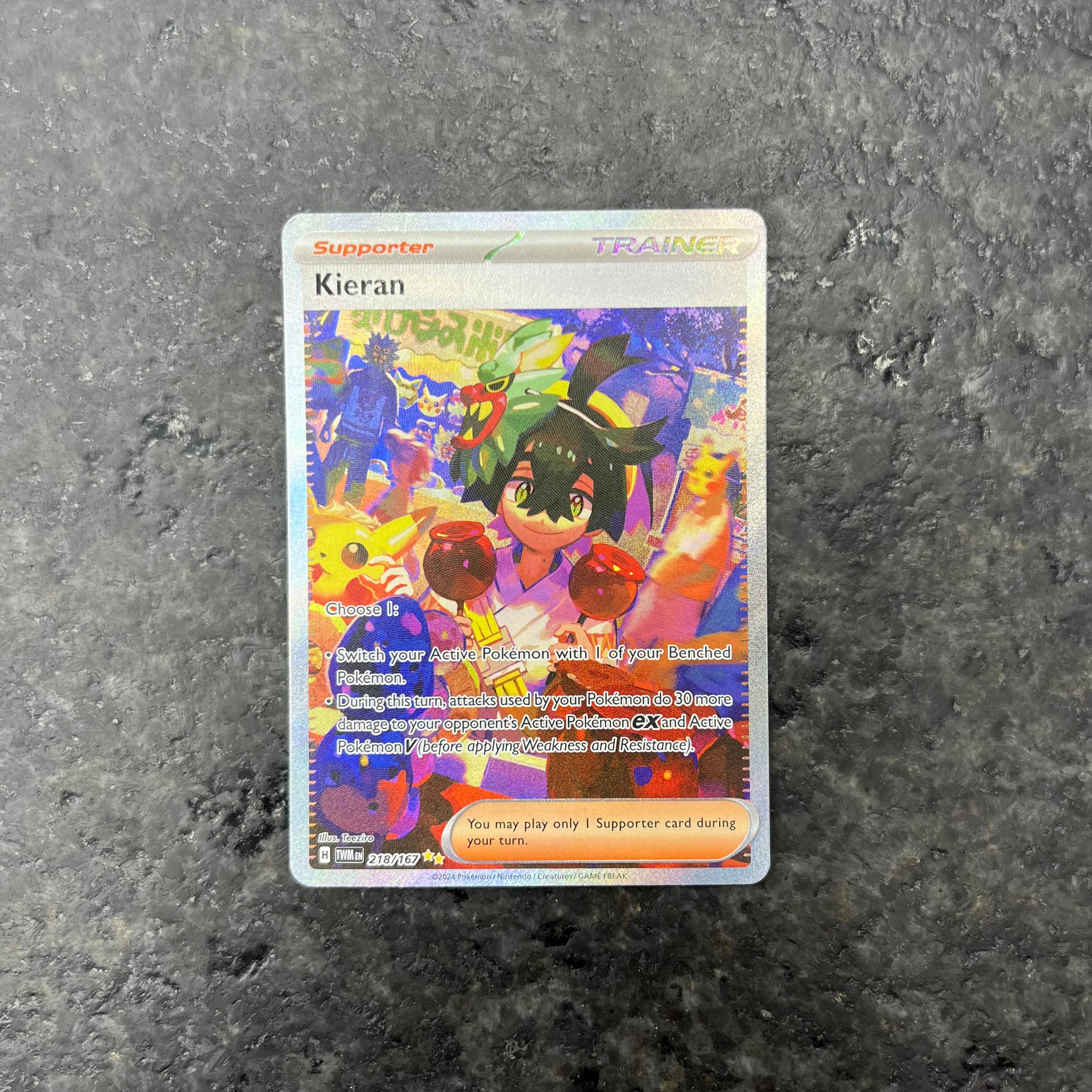 KIERAN TRAINER ALT ART 218/167 (NM)