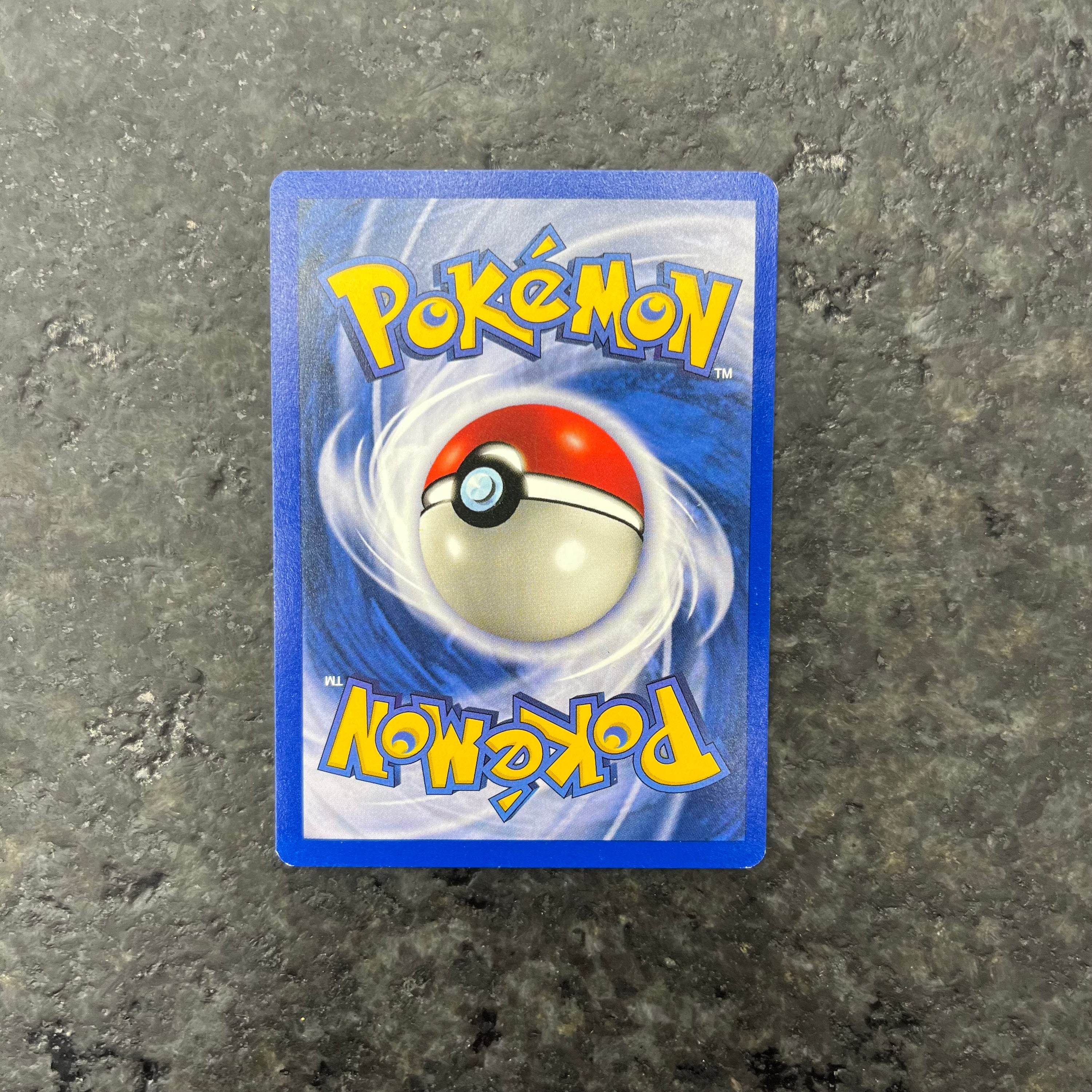 VAPOREON JUNGLE HOLO 12/64 (NM)