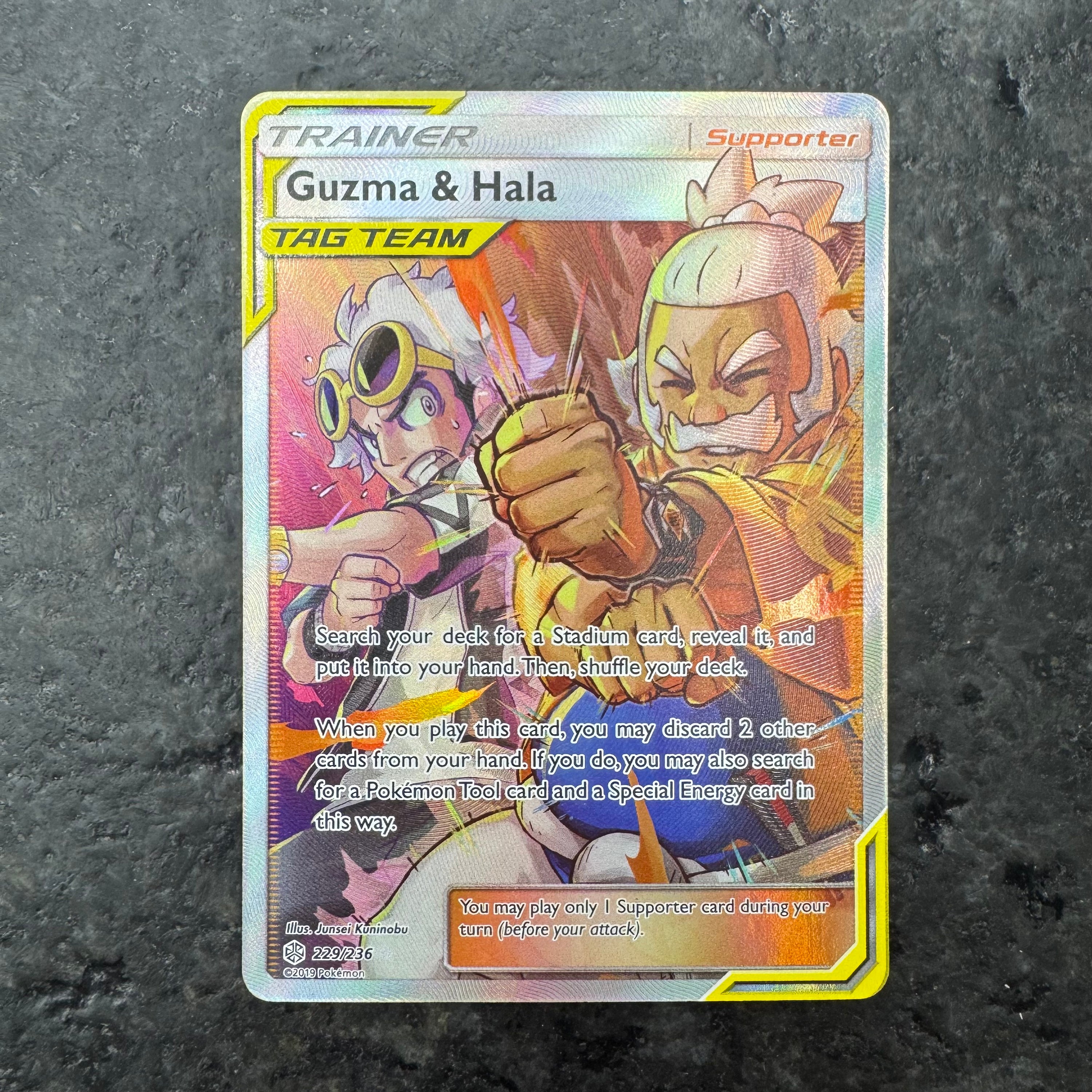 GUZMA & HALA TAG TEAM FULL ART 105/095 (NM)